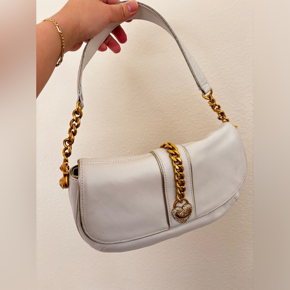 white Juicy couture bag.